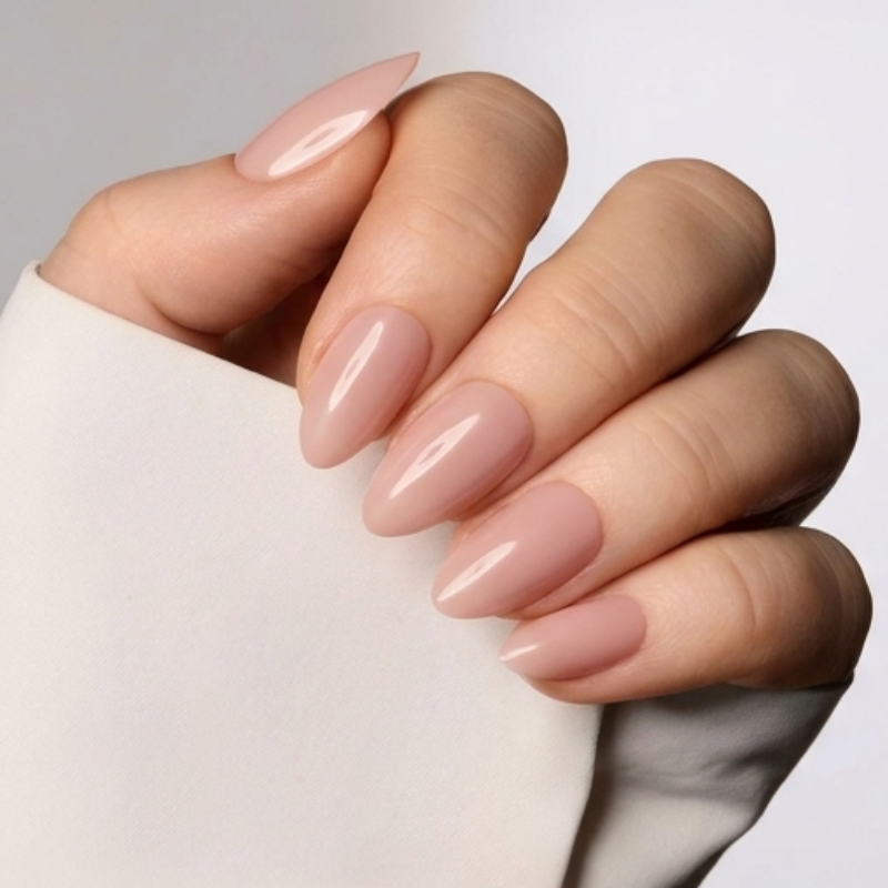 Almond Naked & Bold nude press-on nails on hand